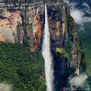 Glorious Angel Falls cutting through the forested mountainside, Canaima National Park, Venezuela