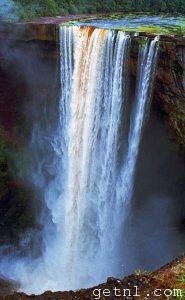 The thundering cascades of Kaieteur Falls shrouded in spray, Kaieteur National Park, Guyana