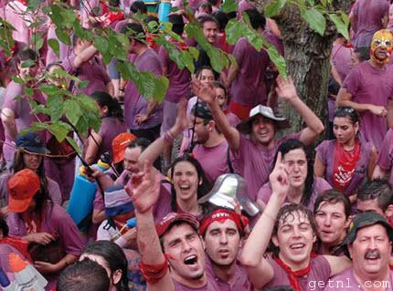 ABOVE A jubilant, wine-drenched crowd after the Haro Wine Battle, Spain