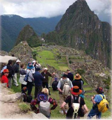 ABOVE A tour group arriving at Machu Picchu on the Inca Trail, Peru