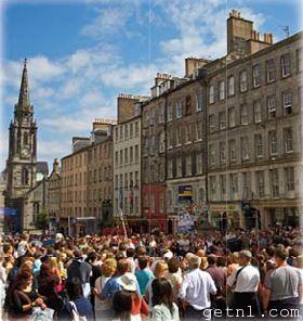 ABOVE Crowds thronging the streets of Edinburgh city center during The Fringe Festival