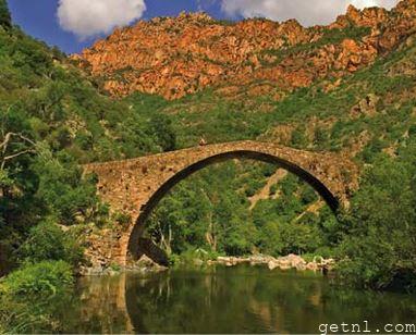 ABOVE Genoese arched bridge in the Spelunca Gorge near Ota, Corsica