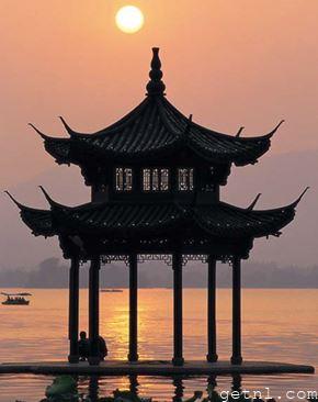 Elegant pagoda adding to the mystical beauty of West Lake, Hangzhou