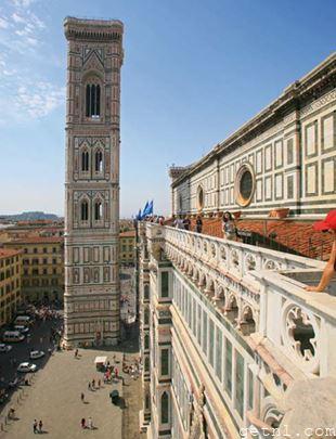 Giotto’s magnificent bell tower, flanked by the Basilica di Santa Maria del Fiore on Piazza del Duomo, Italy