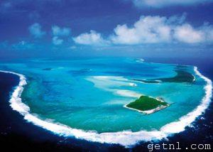 ABOVE Aerial view of the bright-turquoise Aitutaki Lagoon, Cook Islands