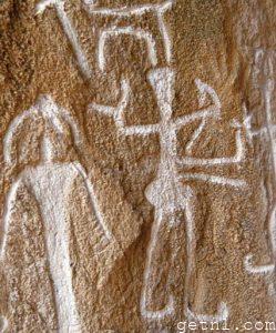Striking petroglyphs at Gobustan, showing what seem to be hunters in pursuit of a horned animal, Azerbaijan