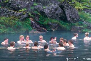 ABOVE Visitors enjoying the natural hot springs at Landmannalaugar