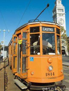 Antique streetcar, part of a vintage transportation system at a station near Embarcadero